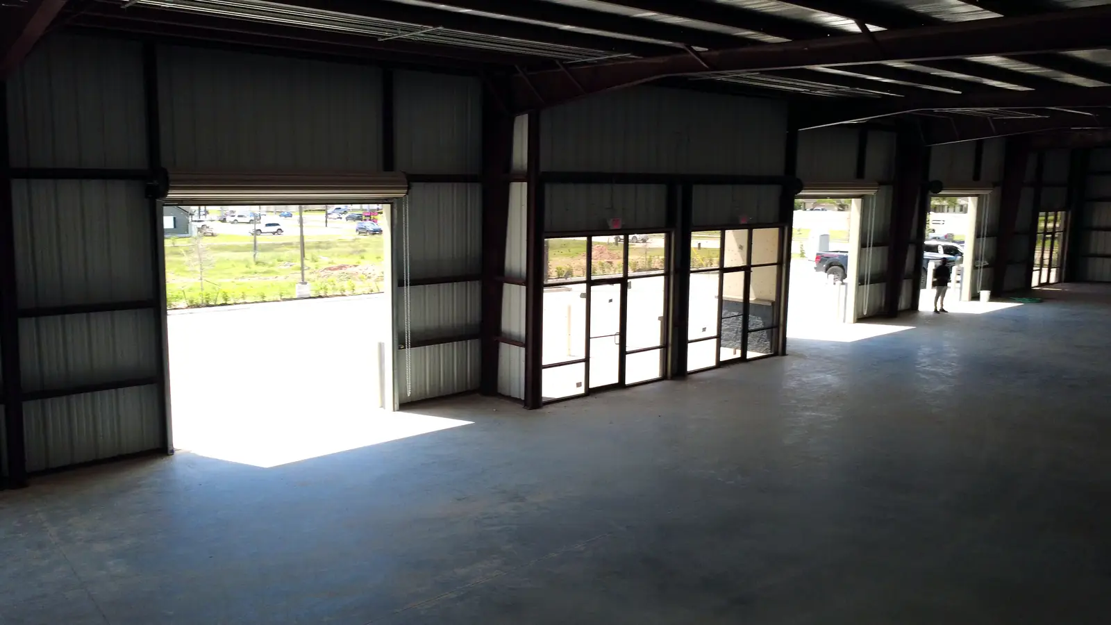 Roll-up door and storefront from inside